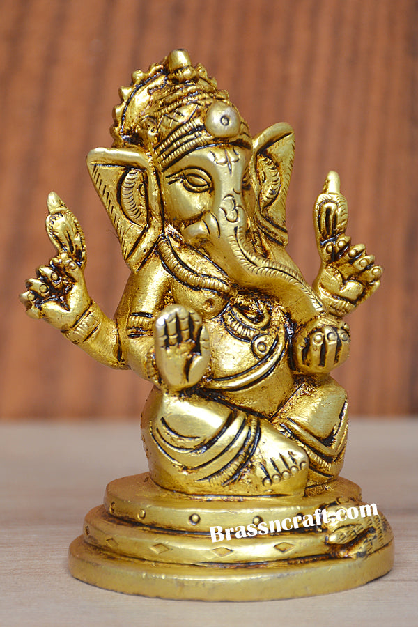 BRASS SITTING GANESH