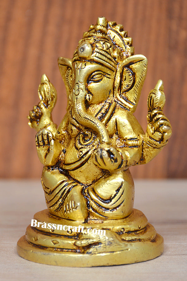 BRASS SITTING GANESH
