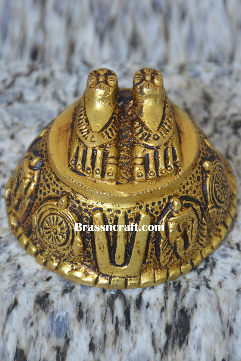 Brass charan